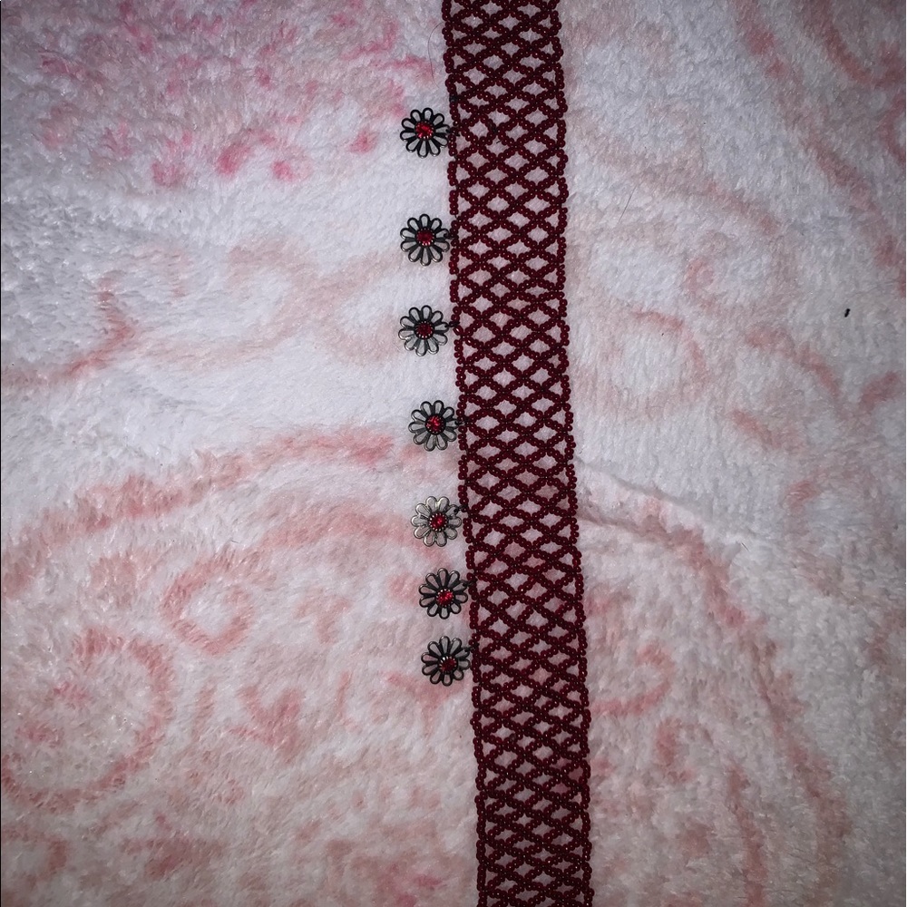 Red beaded chocker with flower pendants